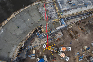 Giant concrete pump on construction site, top view