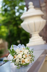 Bouquet lies on the marble railing