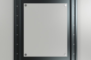 Rectangular white plate on black and white background with rivet