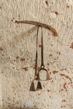 Old stirrup on wall