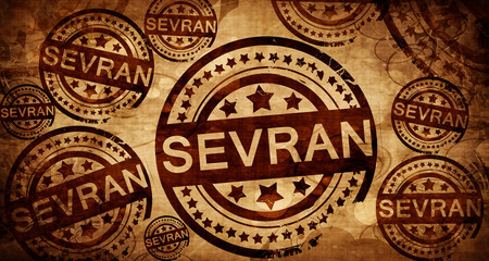 sevran, vintage stamp on paper background