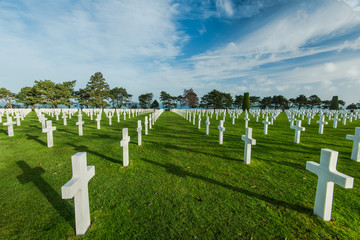 Fototapeta na wymiar Graveyards of fallen soldiers in Normandy