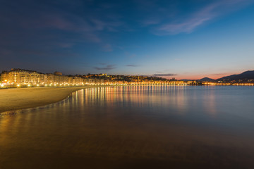 Fototapeta na wymiar Illuminated cityscape of San Sebastian, Spain