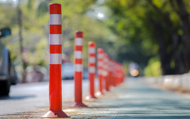 Orange traffic reflective bollards