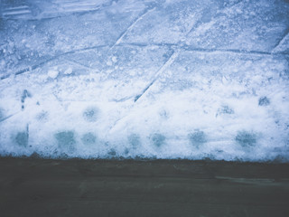 Ice skating rink scratches surface background top view