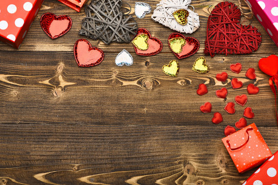 present package and heart on wood as valentines decoration