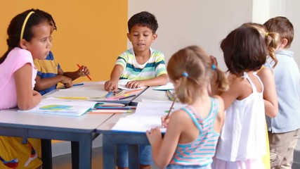 School kids studying in classroom - Powered by Adobe
