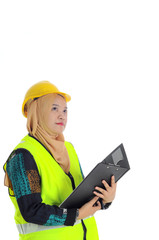 Construction worker wear yellow safety helmet in thinking mode while holding a tablet
