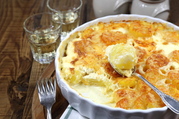 Vegetable potato gratin with cheese and cream