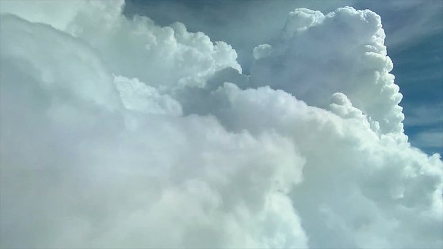 Cockpit View Flying Around Cumulus Buildups