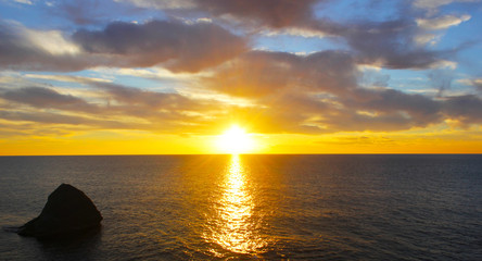 Naklejka na ściany i meble Sunset in the sea