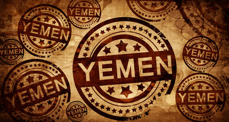 Yemen, vintage stamp on paper background