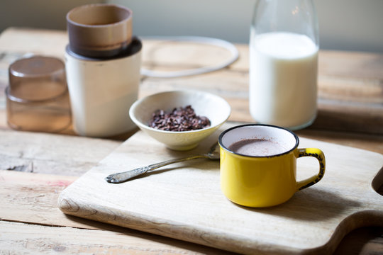 Natural cocoa in yellow mug 