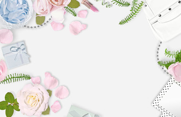 White feminine background. Flat lay. Pink roses, petals, mirror, green leaves, gift, bag. Place for text. Cheerful mind every day 
