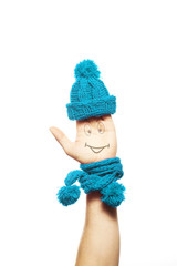 Smiling male hand scarf, hat, white background