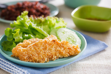 fried fish fillet serve with vegetable for clean eating,thai food