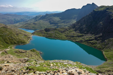 Track in Snowdonia National Park, North Wales, United Kingdom; view of the mountains and the lakes, selective focus