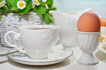 Easter- traditional Easter breakfast - Festive Easter table in white - soft focus, selective focus