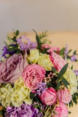 bouquet of pink and white roses and purple flowers
