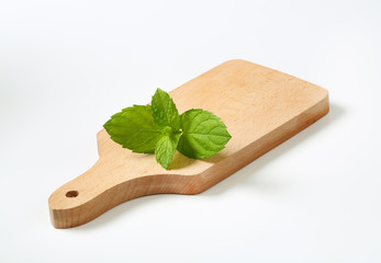 mint leaves on cutting board