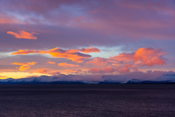 Sunset colors on winter ice at the Vestrahorn mountain on the St