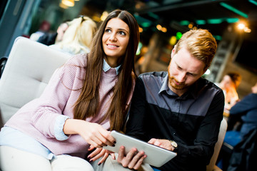 Young couple with tablet