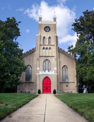 Fototapeta na wymiar church with red doors