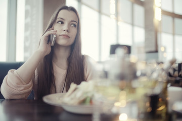 young girl chatting on the phone Internet Addiction Disorder