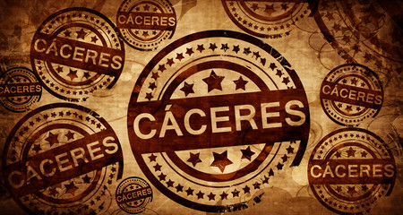 Caceres, vintage stamp on paper background