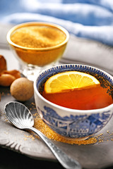 A cup of fresh tea with lemon