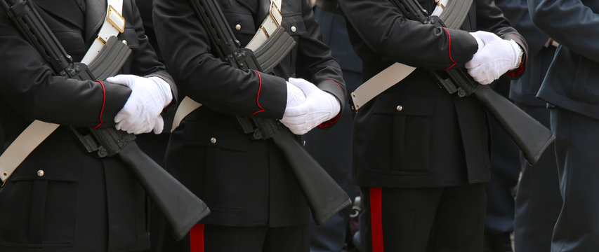 three italian police in full uniform