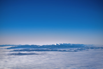 View of clouds covered Tatra mountain peaks