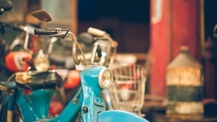 Retro blue motorcycle in a vintage style.