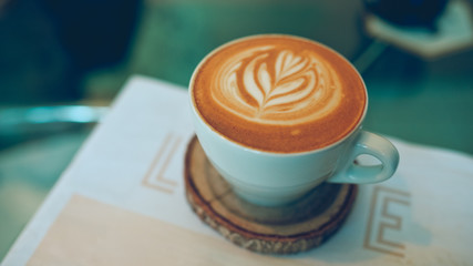  Hot latte art in vintage style.
