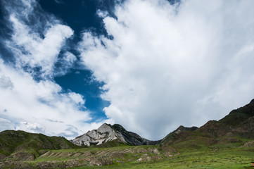 Obraz na płótnie Canvas Altai Mountains at cloudy skies background