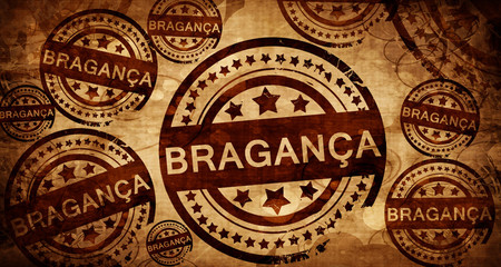 Braganca, vintage stamp on paper background