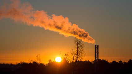 pipe and smoke at sunset dawn