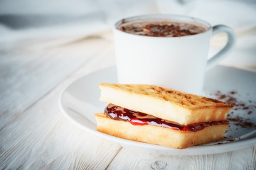 waffles with jam and cup cacao