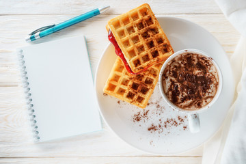 Obraz na płótnie Canvas breakfast waffles and cocoa