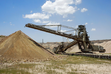 Excavators and dumps