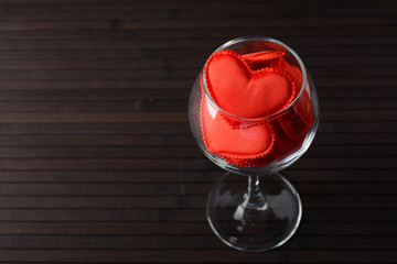 Red hearts in a glass