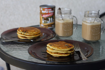 blueberry pancakes with hot chocolate and coffee in a jar style mug