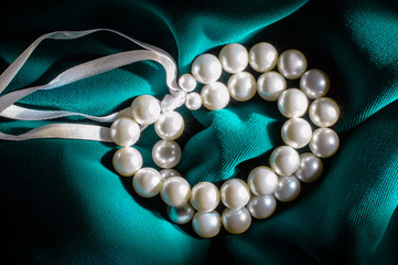 White pearl bracelet.
