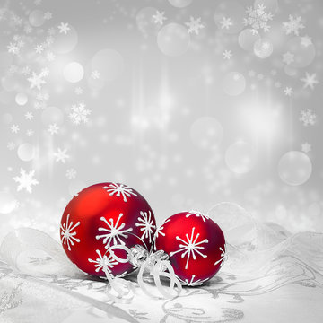 Red Christmas decorations on winter background, text space