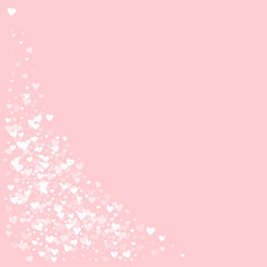 White hearts confetti. Bottom left corner on pale_pink valentine background. Vector illustration.