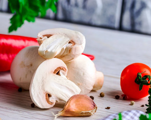 mushroom on a wooden Board with a knife