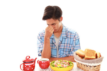 食欲不振の男性