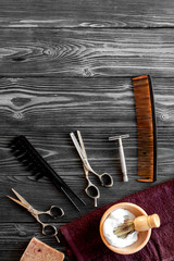 Tools for cutting beard barbershop top view on wooden background