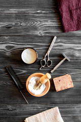 Tools for cutting beard barbershop top view on wooden background