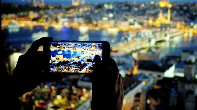 00:10 | 00:13
1&times;

Woman takes a picture of night Istanbul panorama with her compact camera